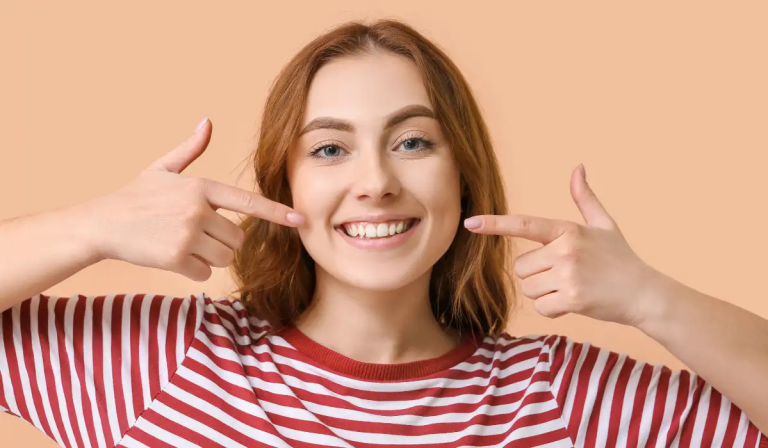 Dentist in Georgetown at Dentistry On Sinclair performing a comprehensive oral health examination.