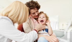 Family dentist at Dentistry On Sinclair Georgetown coordinating seasonal treatment planning for families